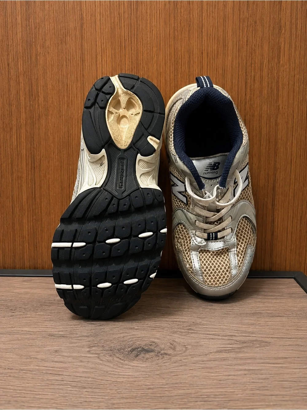 Used good New Balance Kids Beige and Navy 590 Sneaker